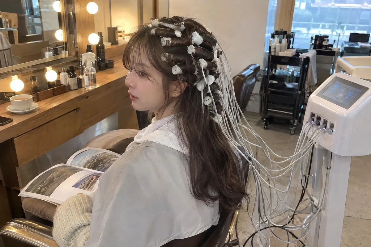 Digital perm rods during a Korean perm at a Seoul hair salon
